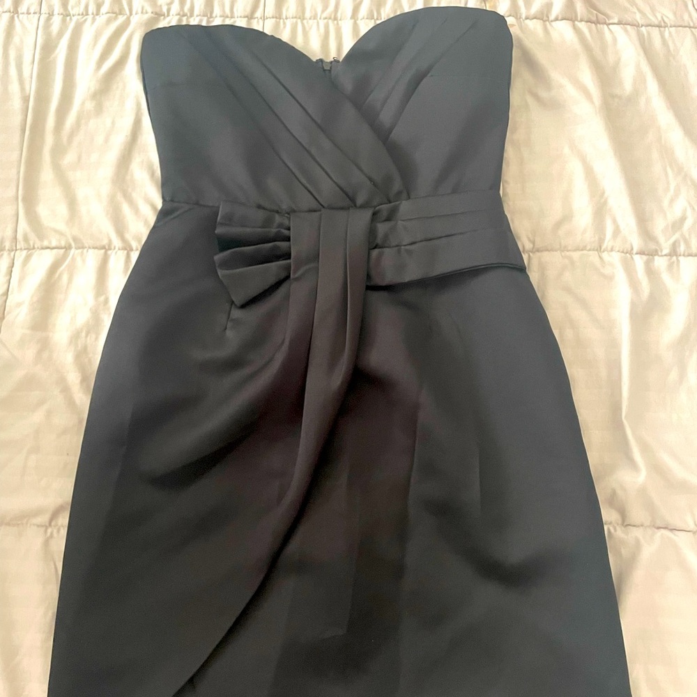 Black strapless cocktail dress with leg slit